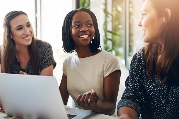 Women in a meeting with a laptop